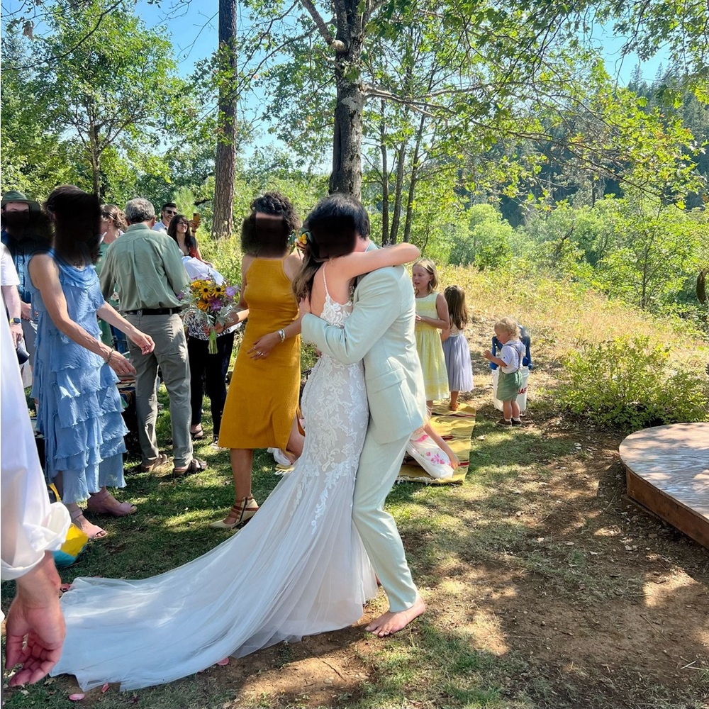 Justin Alexander fit and flare/mermaid wedding dress